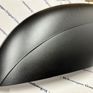 Genuine VW wing mirror lower cover cap in satin black and fits T5.1 / T6 / T6.1 models.